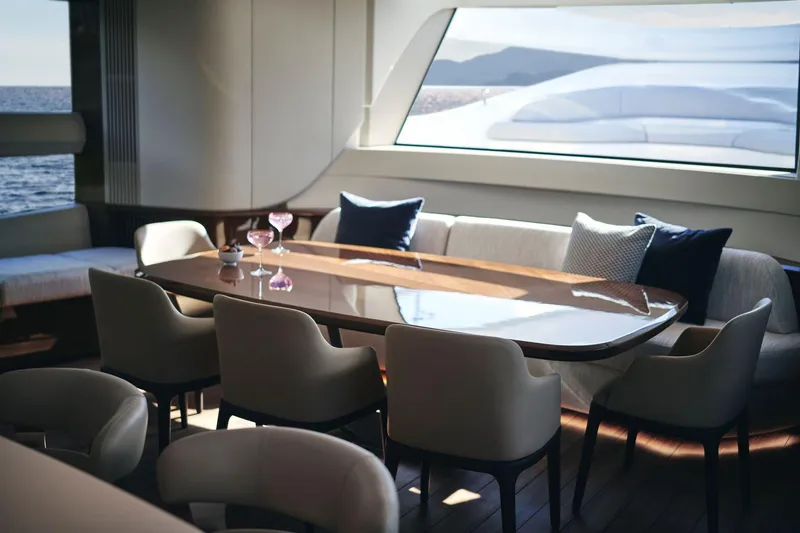 Slide: The Image of Luxurious interior of 2025 Princess X95 yacht with elegant dining area and ocean view. - 19