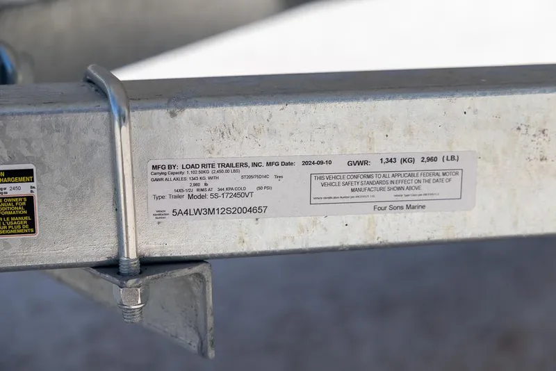 Slide: The Image of Label on a Coastal Skiff 184 trailer, showing specifications and manufacturer details. - 24