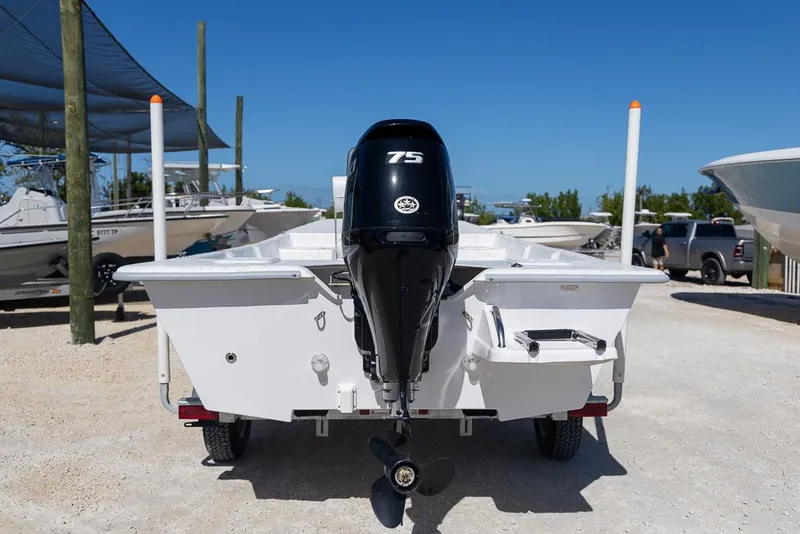 Slide: The Image of 2025 Coastal Skiff 184 boat with 75 HP outboard motor, rear view. - 3