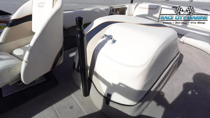 Slide: The Image of 2003 Nautique Air Nautique 216 boat interior with white seating and Race City Marine logo. - 18