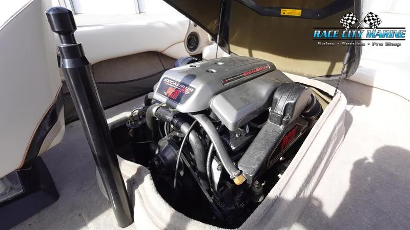 Slide: The Image of 2003 Nautique Air Nautique 216 engine compartment, featuring a powerful Excalibur 330 engine. - 19
