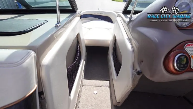 Slide: The Image of 2003 Nautique Air Nautique 216 boat interior with Race City Marine branding. - 31