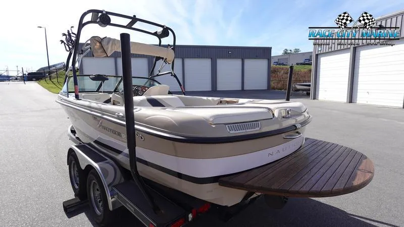 Slide: The Image of 2003 Nautique Air Nautique 216 boat on trailer at Race City Marine. - 7
