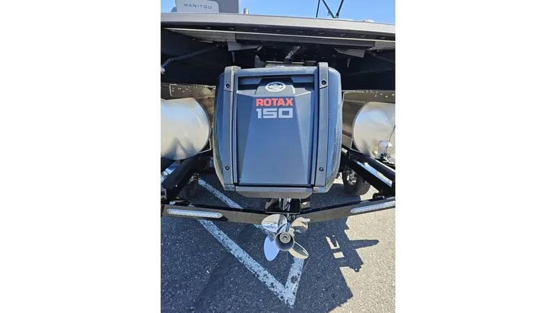 Slide: The Image of 2025 Manitou 20 CRUISE MAX with 150hp Rotax Stealth Motor, rear view. - 17