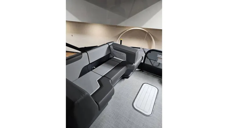 Slide: The Image of 2025 Manitou 20 CRUISE MAX interior with sleek seating and modern design. - 18