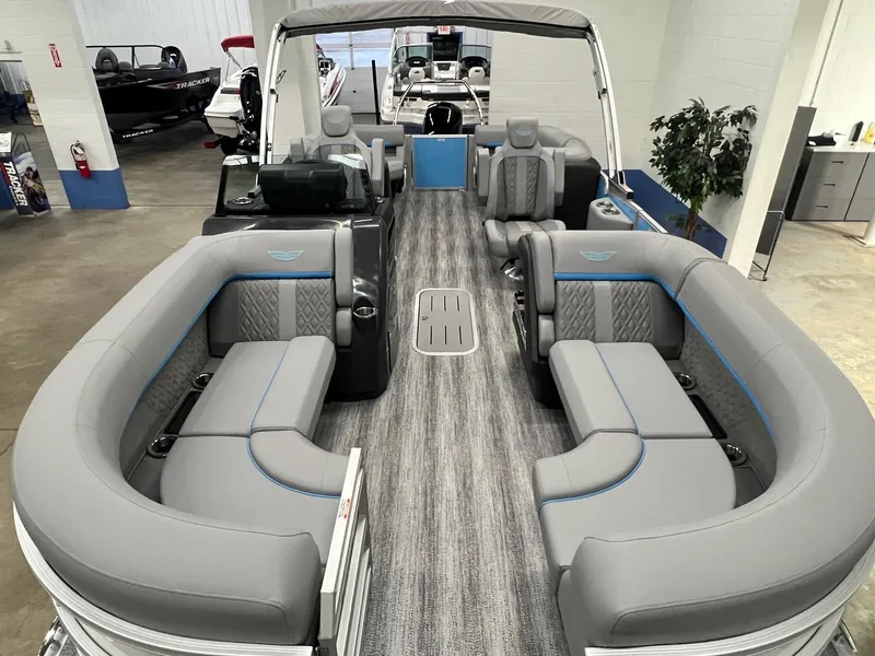 Slide: The Image of 2025 Bennington 22M FASTBACK pontoon boat with spacious seating and modern interior design. - 4