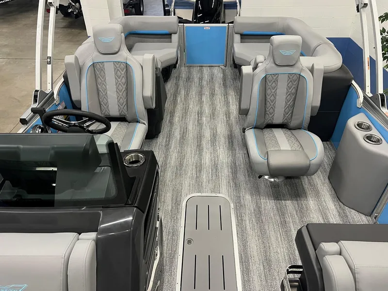 Slide: The Image of 2025 Bennington 22M FASTBACK interior with modern seating and sleek design. - 5