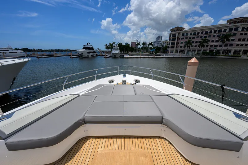 Slide: The Image of Luxurious 2025 Princess Y85 Motor Yacht docked in a scenic marina. - 24