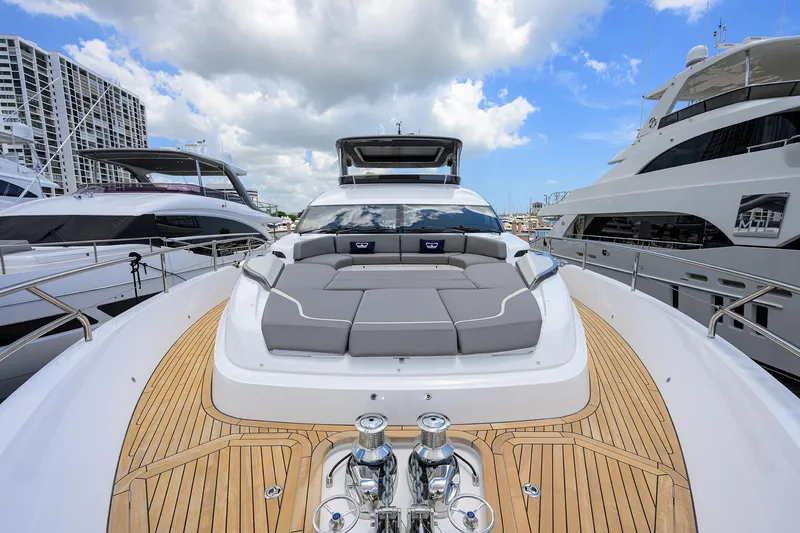 Slide: The Image of 2025 Princess Y85 Motor Yacht with spacious deck and luxurious seating. - 26