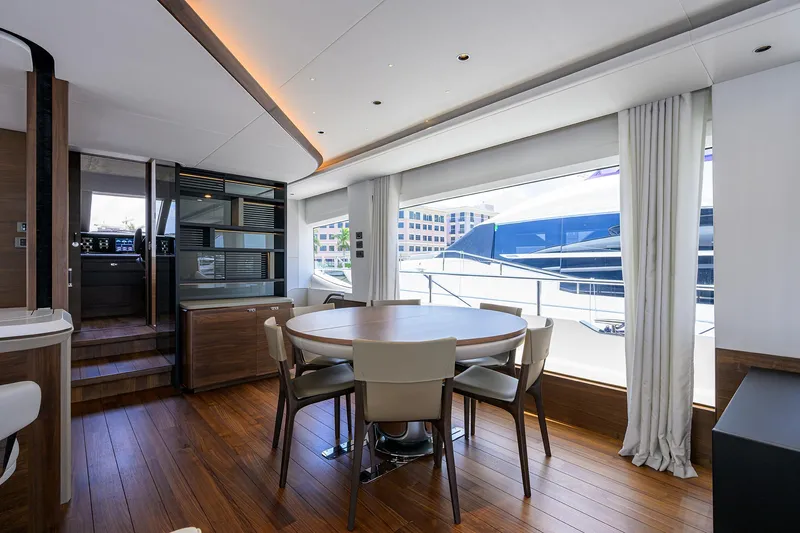 Slide: The Image of Luxurious interior of 2025 Princess Y85 Motor Yacht with elegant dining area. - 30