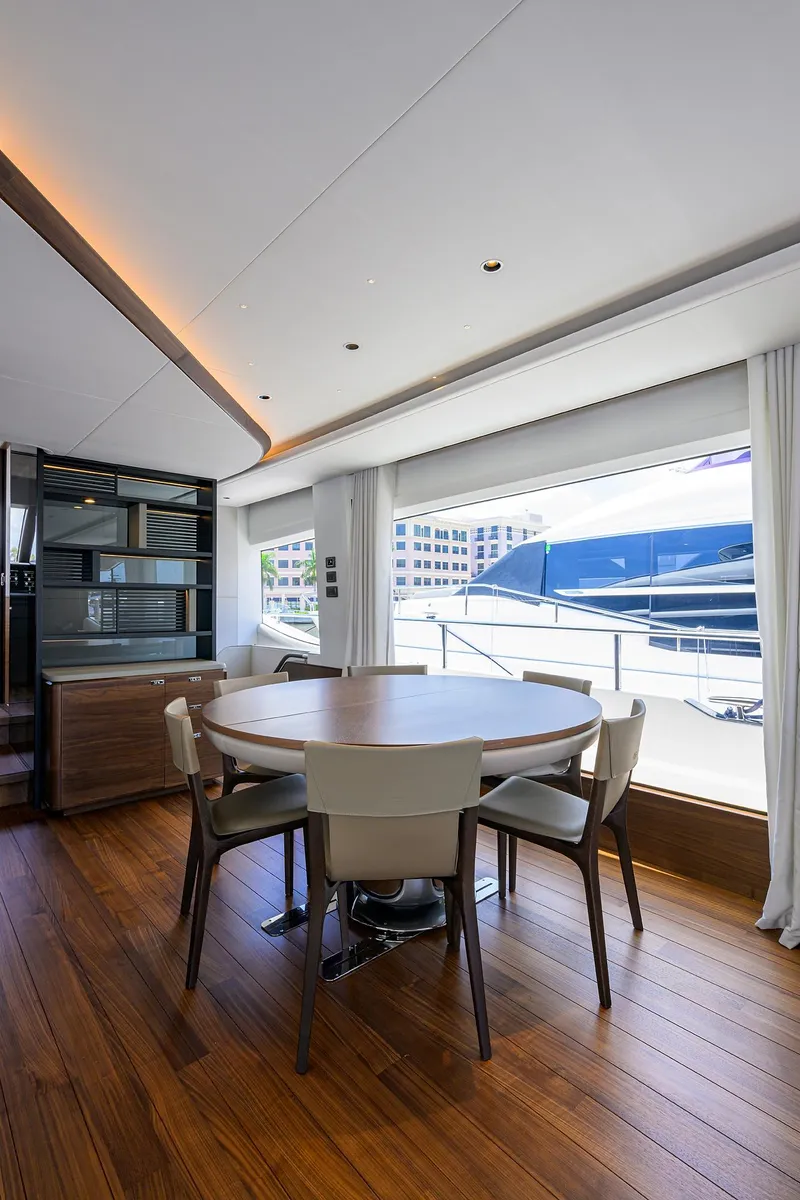 Slide: The Image of Luxurious interior of 2025 Princess Y85 Motor Yacht with elegant dining area. - 31