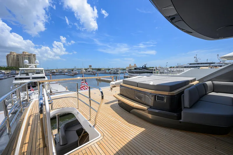 Slide: The Image of Luxurious 2025 Princess Y85 Motor Yacht deck with marina view. - 41