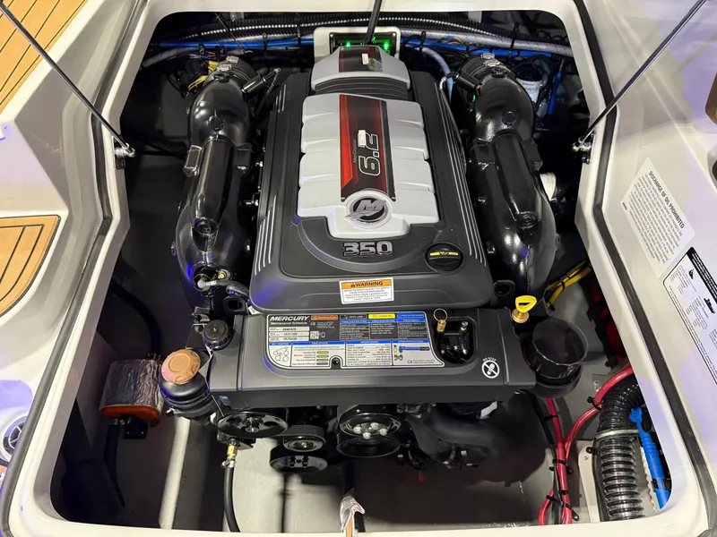 Slide: The Image of Engine compartment of 2025 Crownline 280 SS boat, featuring a powerful 350 horsepower engine. - 9