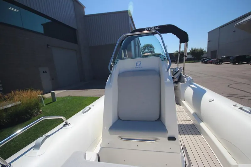 Slide: The Image of 2025 Zodiac Medline 6.8 NEO boat with 200hp engine, featuring sleek design and chrome details. - 22
