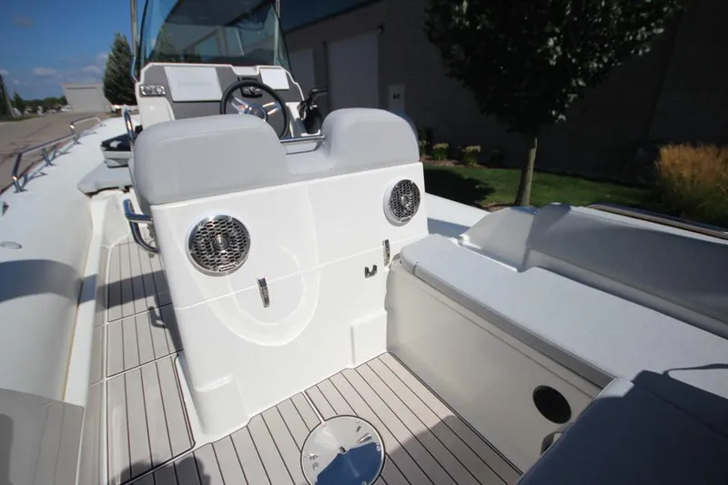 Slide: The Image of 2025 Zodiac Medline 6.8 NEO boat deck, white with stainless steel railings. - 12