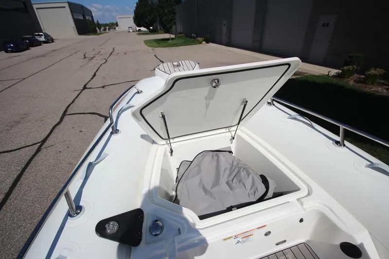 Slide: The Image of 2025 Zodiac Medline 6.8 NEO boat interior with steering wheel and seating. - 27