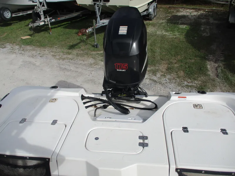 Slide: The Image of Fishmaster 22 boat, 2005 model, with a 175 horsepower outboard motor. - 6
