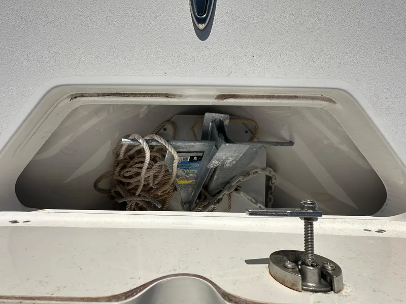 Slide: The Image of Anchor storage compartment on 2023 Sea Pro 239 Deep V CC boat. - 15