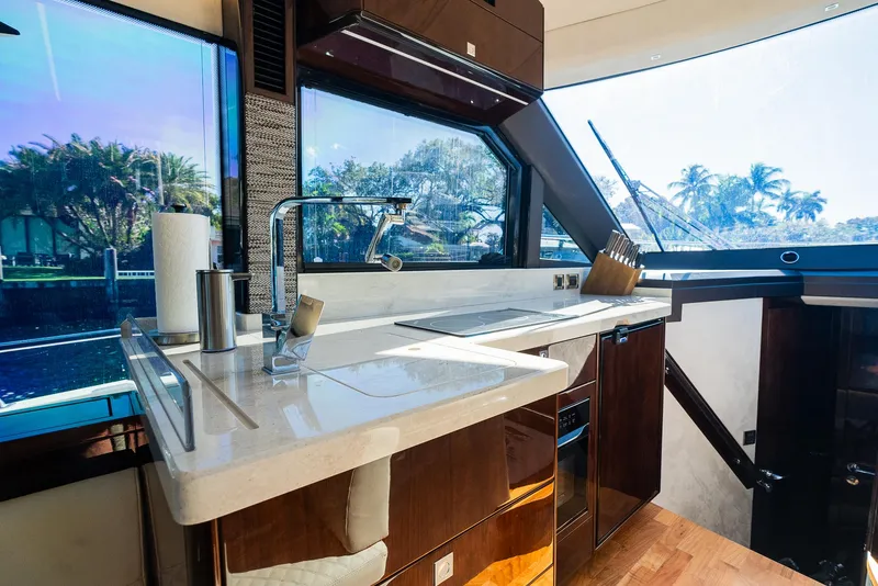 Slide: The Image of Luxurious kitchen interior of 2022 Galeon 400 Fly yacht with modern amenities. - 30