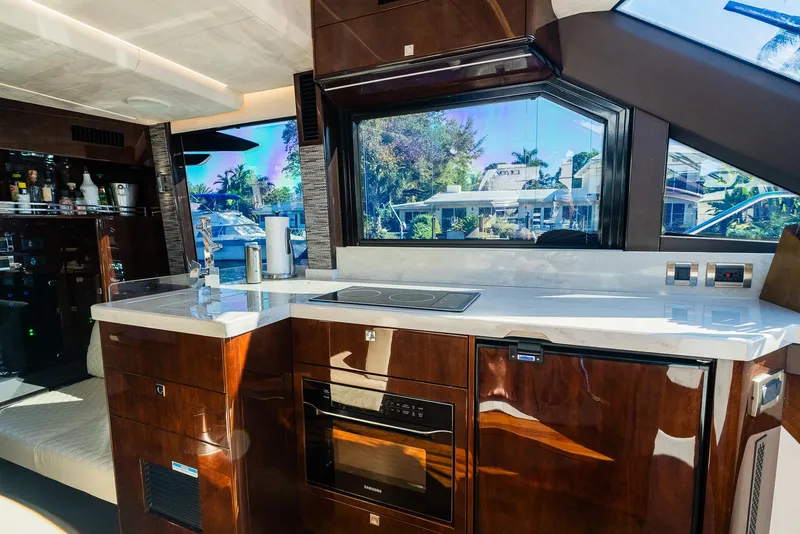 Slide: The Image of Luxurious kitchen interior of 2022 Galeon 400 Fly yacht with modern amenities. - 31