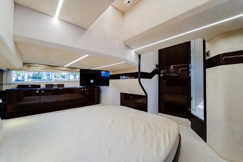 Slide: The Image of Luxurious interior of 2022 Galeon 400 Fly yacht with modern design and ambient lighting. - 38