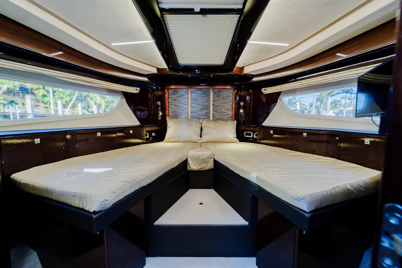 Slide: The Image of Luxurious interior of 2022 Galeon 400 Fly yacht with elegant bedding and modern design. - 39