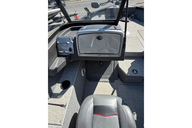 Slide: The Image of 2022 Tracker Pro Guide V-175 WT boat interior with seating and dashboard view. - 11