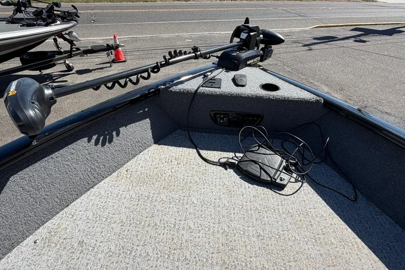 Slide: The Image of 2022 Tracker Pro Guide V-175 WT boat with Minn Kota trolling motor on deck. - 12