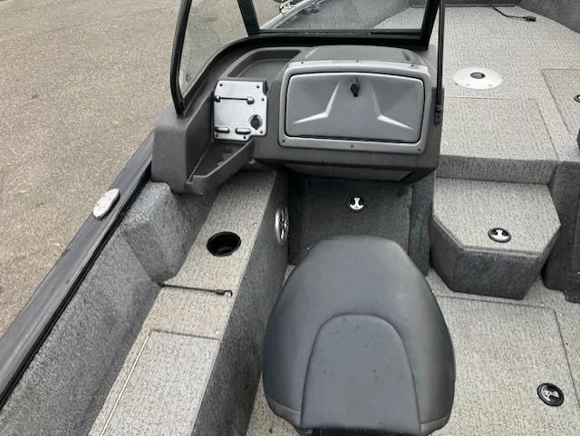 Slide: The Image of 2022 Tracker Pro Guide V-175 WT boat interior with seating and storage compartments. - 5