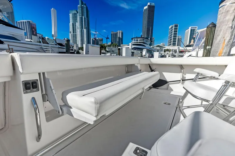 Slide: The Image of Tiara Yachts 4200 Open 2004, sleek deck with city skyline backdrop. - 26