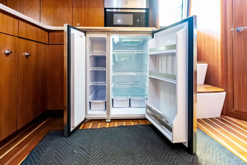 Slide: The Image of Open refrigerator in 2004 Tiara Yachts 4200 Open kitchen interior. - 40