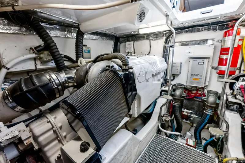 Slide: The Image of Engine room of 2004 Tiara Yachts 4200 Open, showcasing machinery and equipment. - 46