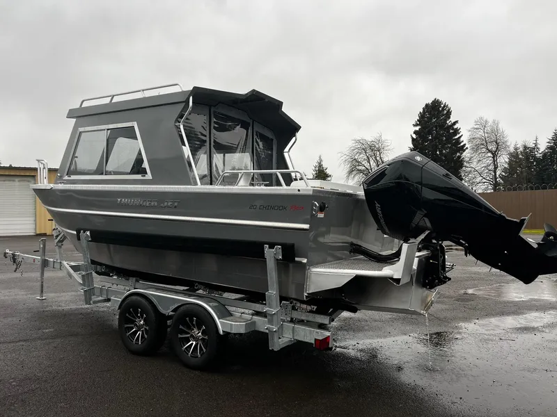 Slide: The Image of 2024 Thunder Jet 20 Chinook Pro boat on trailer, parked outdoors. - 3
