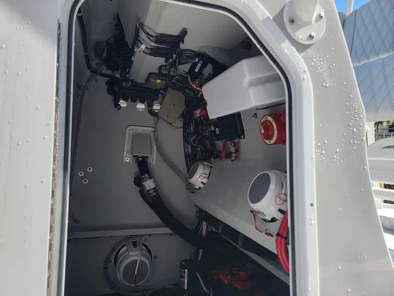 Slide: The Image of Interior view of 2025 Shallow Sport 24 Modified V boat showing wiring and components. - 26