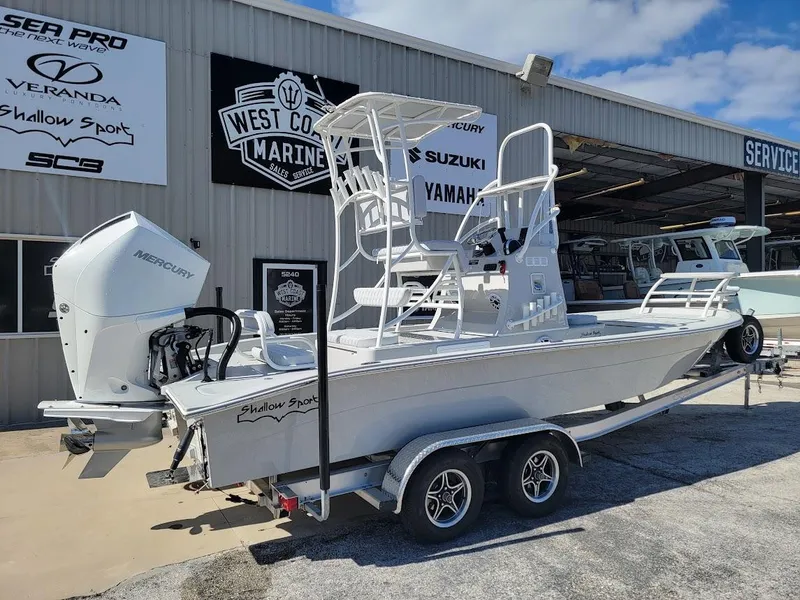 Slide: The Image of 2025 Shallow Sport 24 Modified V boat on trailer at West Coast Marine. - 29