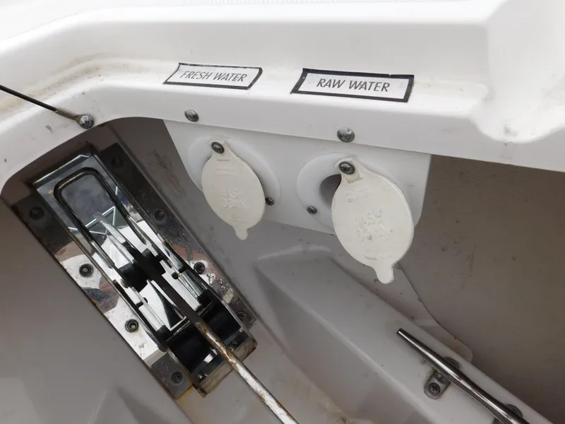 Slide: The Image of 2018 Pursuit OS 325 Offshore boat water connections labeled fresh and raw. - 38