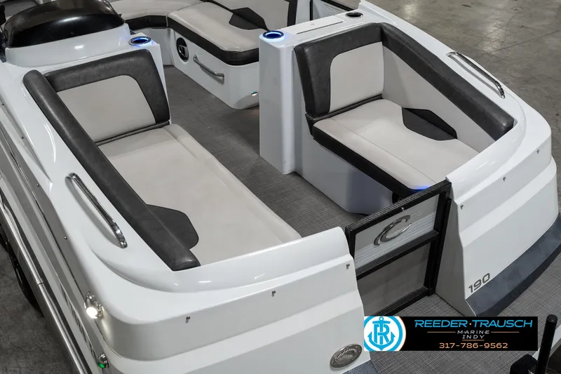 Slide: The Image of 2019 Crest Calypso 190 boat interior with gray and white seating, modern design. - 10
