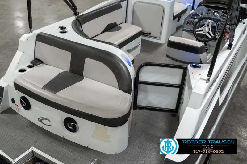 Slide: The Image of 2019 Crest Calypso 190 boat interior with seating and steering console. - 11
