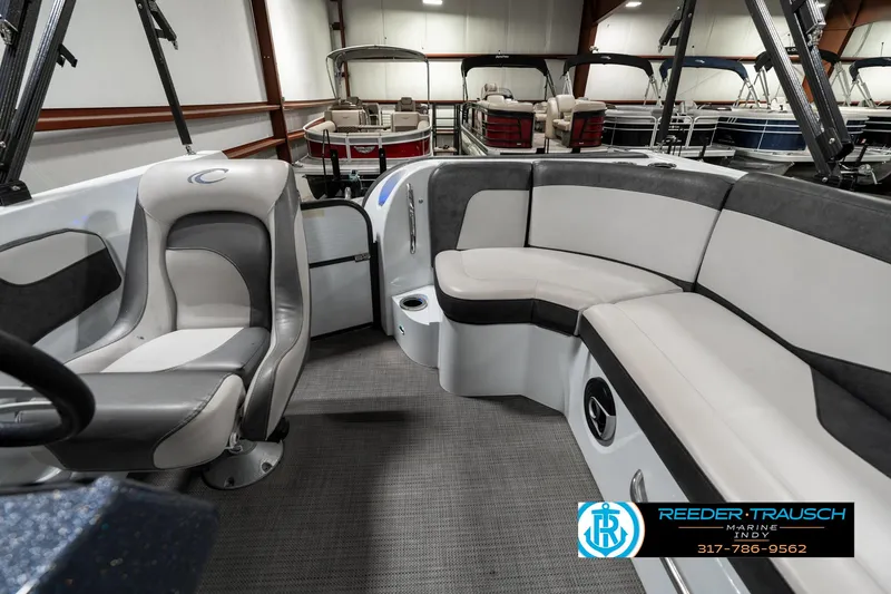 Slide: The Image of 2019 Crest Calypso 190 boat interior with plush seating and modern design. - 14