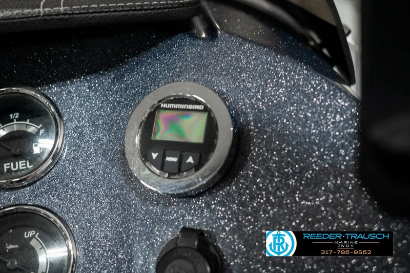 Slide: The Image of Dashboard of 2019 Crest Calypso 190 boat with Humminbird display and fuel gauge. - 35