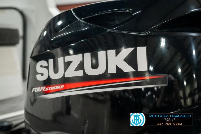 Slide: The Image of Suzuki four-stroke engine on 2019 Crest Calypso 190 boat. - 46