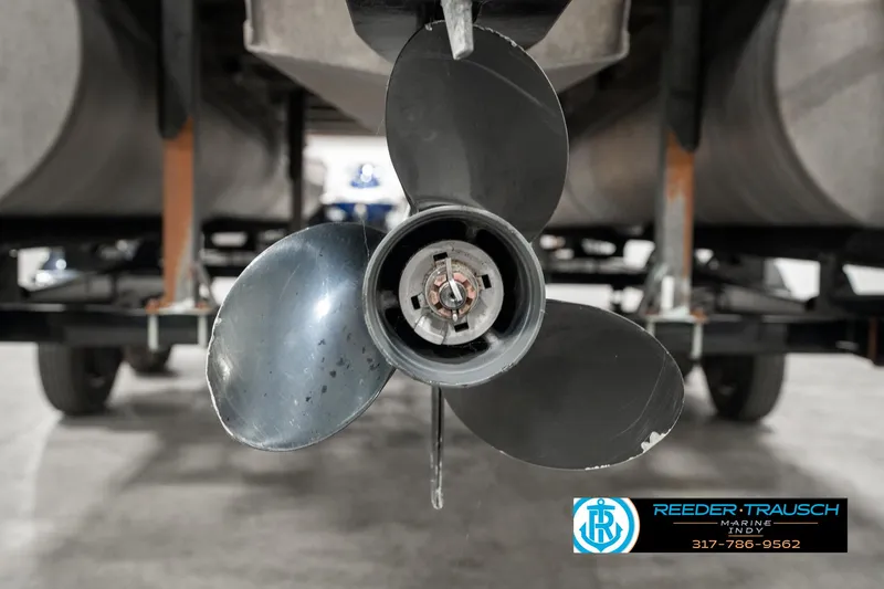 Slide: The Image of 2019 Crest Calypso 190 boat propeller close-up in a garage setting. - 48