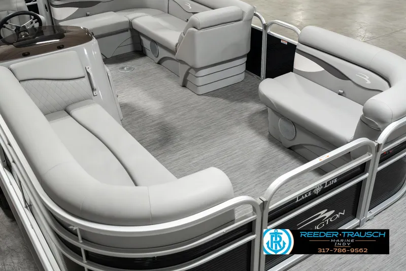 Slide: The Image of 2023 Bennington 20 SVL pontoon boat interior with plush seating and modern design. - 10