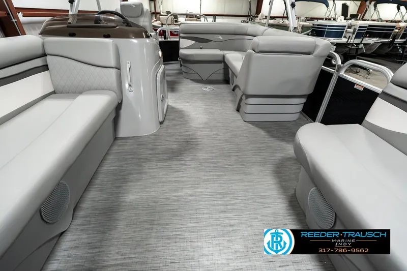 Slide: The Image of 2023 Bennington 20 SVL pontoon boat interior with gray seating and flooring. - 13