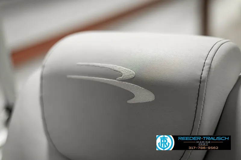 Slide: The Image of 2023 Bennington 20 SVL boat seat with logo, Reeder-Trausch Marine contact info. - 38