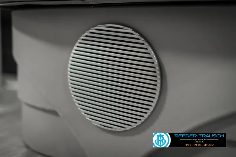 Slide: The Image of 2023 Bennington 20 SVL boat speaker detail, Reeder-Trausch Marine branding. - 40