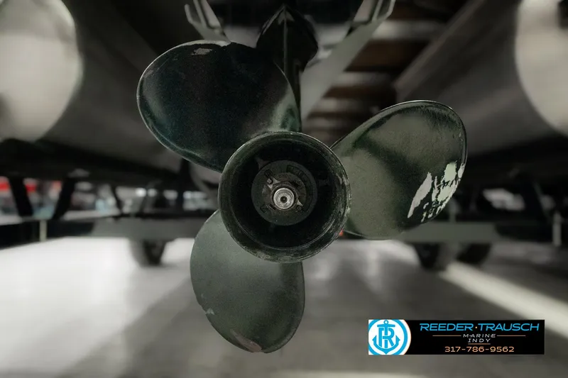 Slide: The Image of Close-up of 2023 Bennington 20 SVL boat propeller in a showroom. - 44
