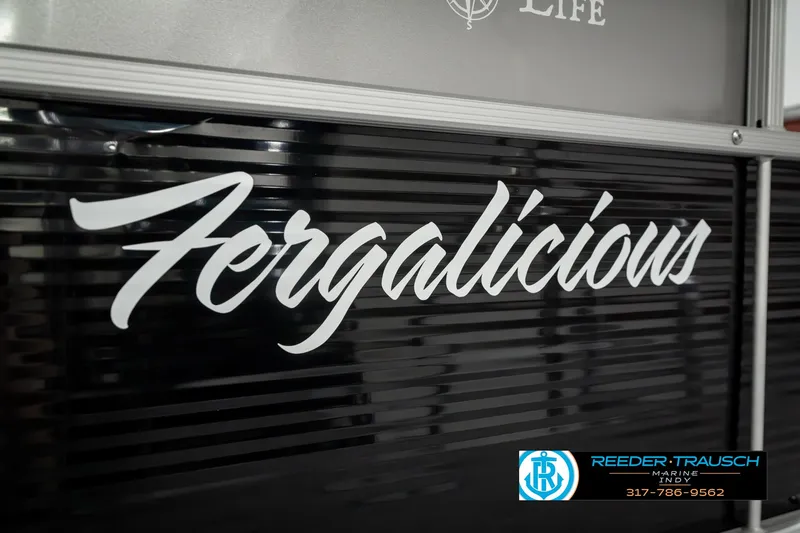 Slide: The Image of 2023 Bennington 20 SVL boat with "Fergalicious" decal, Reeder-Trausch Marine logo. - 47