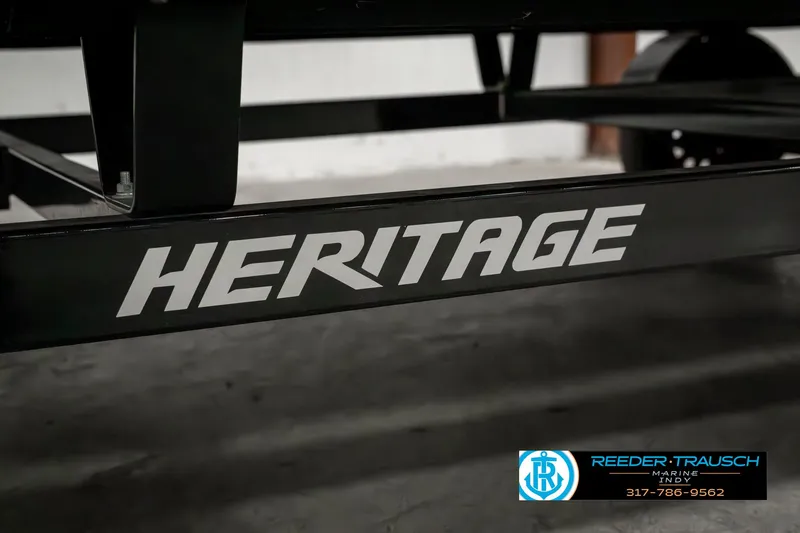 Slide: The Image of Trailer with "Heritage" branding for 2023 Bennington 20 SVL boat. - 49