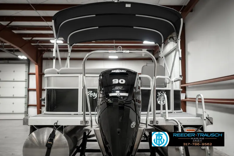 Slide: The Image of 2023 Bennington 20 SVL pontoon boat with Mercury 90 engine in a warehouse. - 7